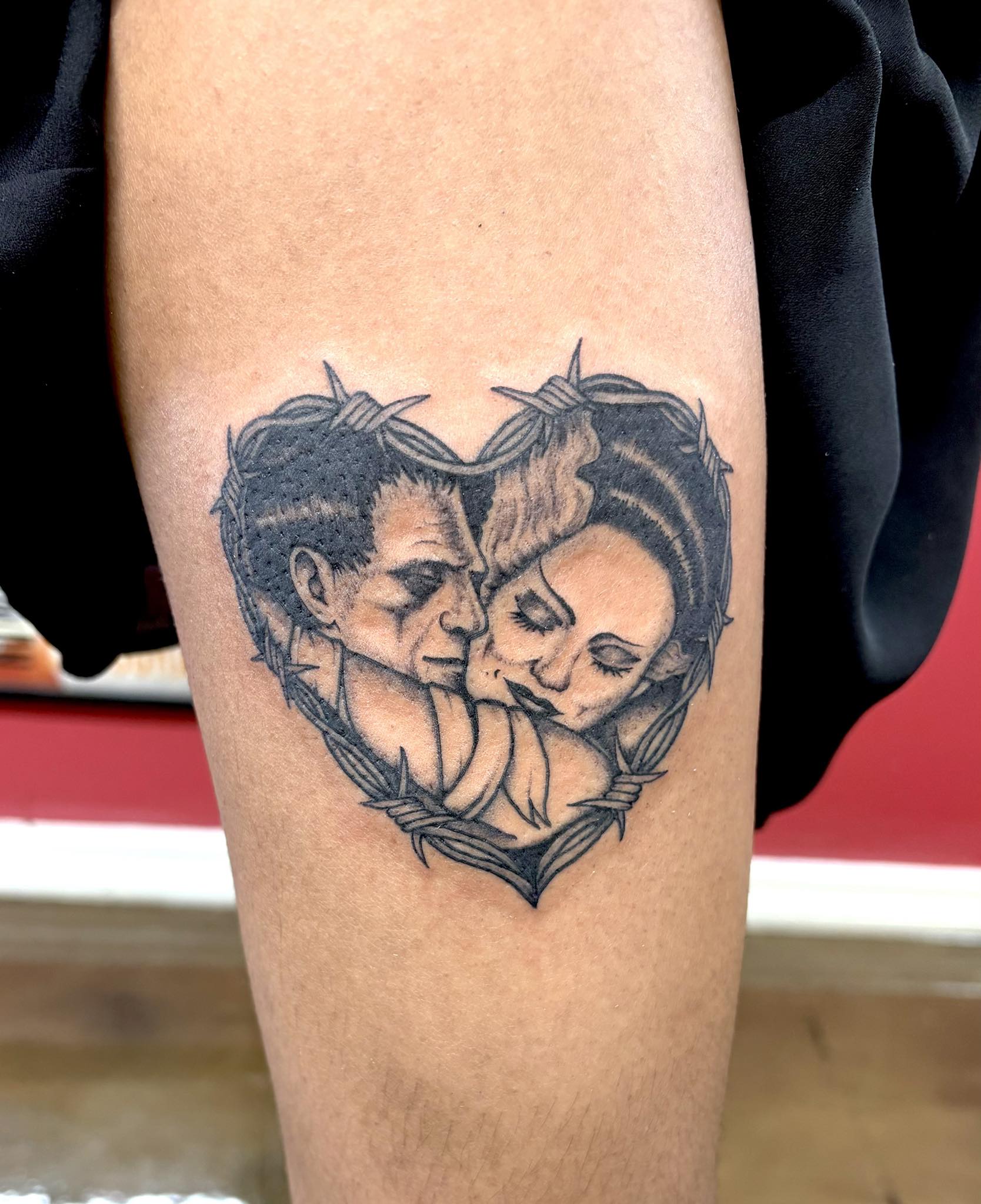 Frankenstein and Bride of Frankenstein portrait in a barbed wire heart frame