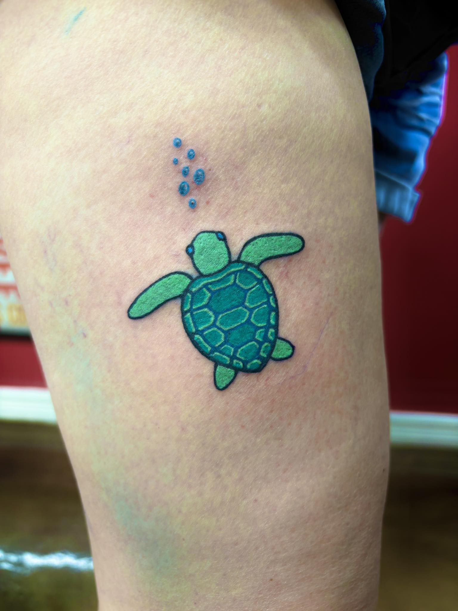 Green sea turtle with bubbles in vibrant color